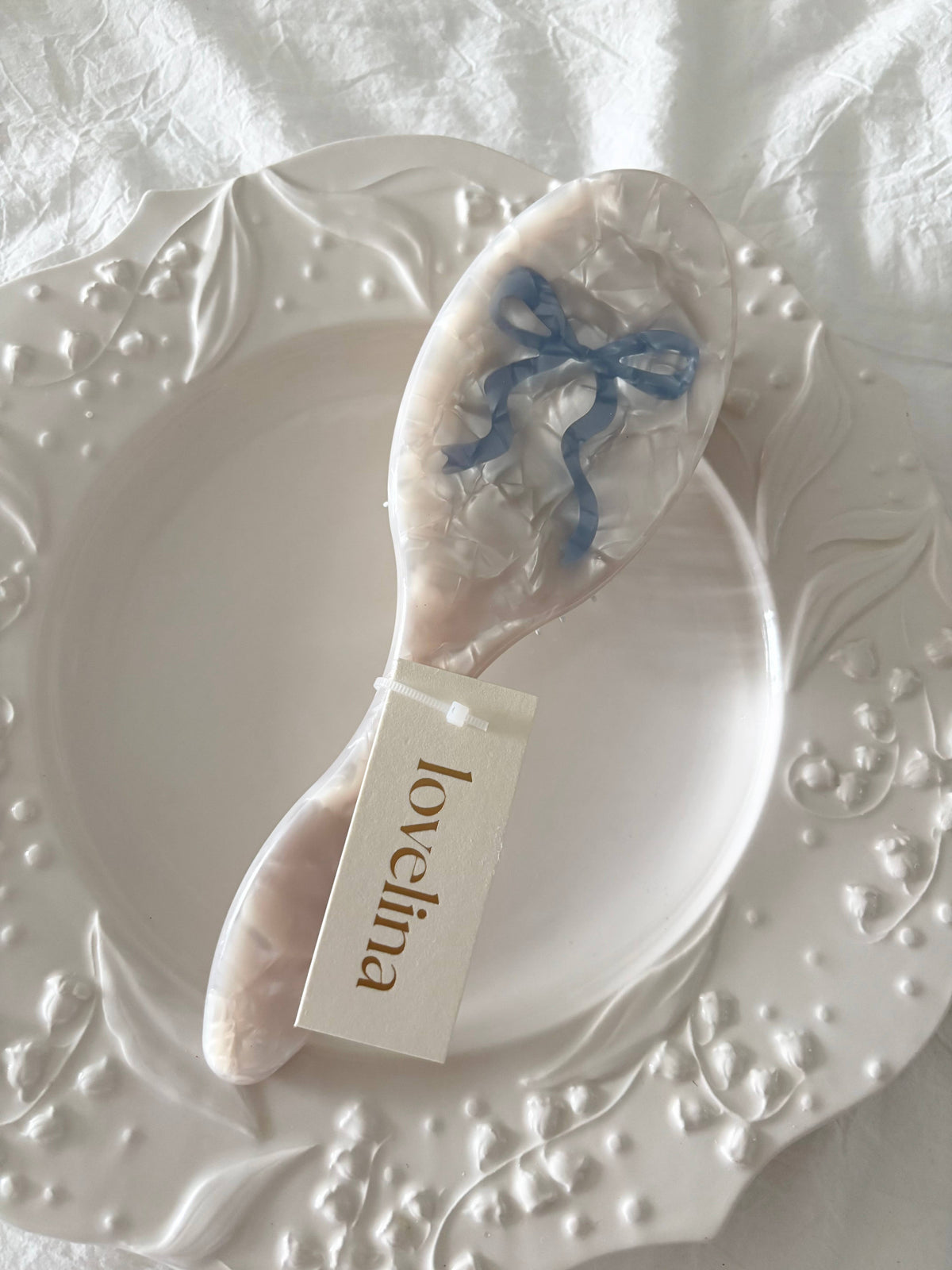 Vintage Acetate Bow Hair Brush, white with blue bow